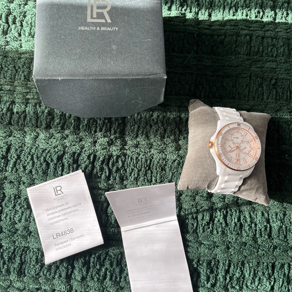German LR Health & Beauty White and Gold Watch